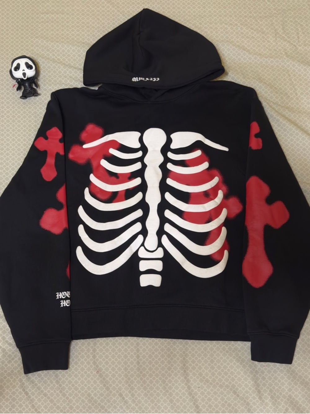 Black Hoodie with White Skeleton Graphic and Red Accents